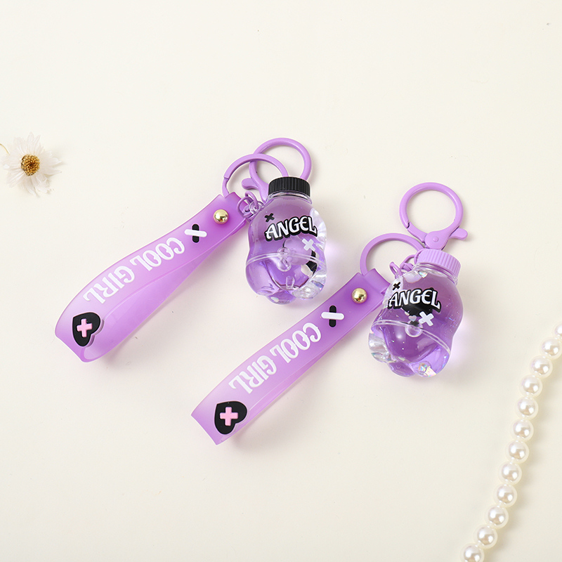 Rebel Sweetheart Coke bottle oil floating keychain