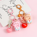 cream Holding face keychain